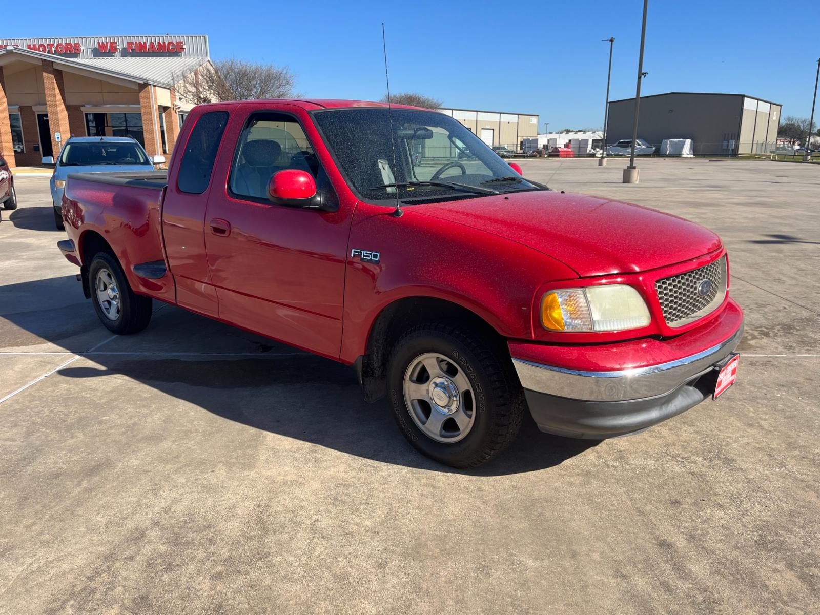 2003 red /TAN Ford F-150 XL SuperCab Flareside 2WD (1FTRX07213K) with an 4.2L V6 OHV 12V engine, Automatic transmission, located at 14700 Tomball Parkway 249, Houston, TX, 77086, (281) 444-2200, 29.928619, -95.504074 - Photo #0